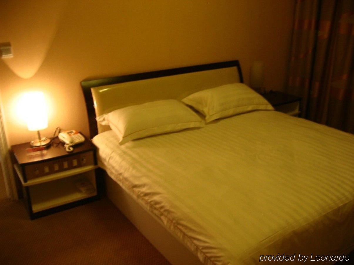 Jiujiu Holiday Hotel Σανγκάη Δωμάτιο φωτογραφία