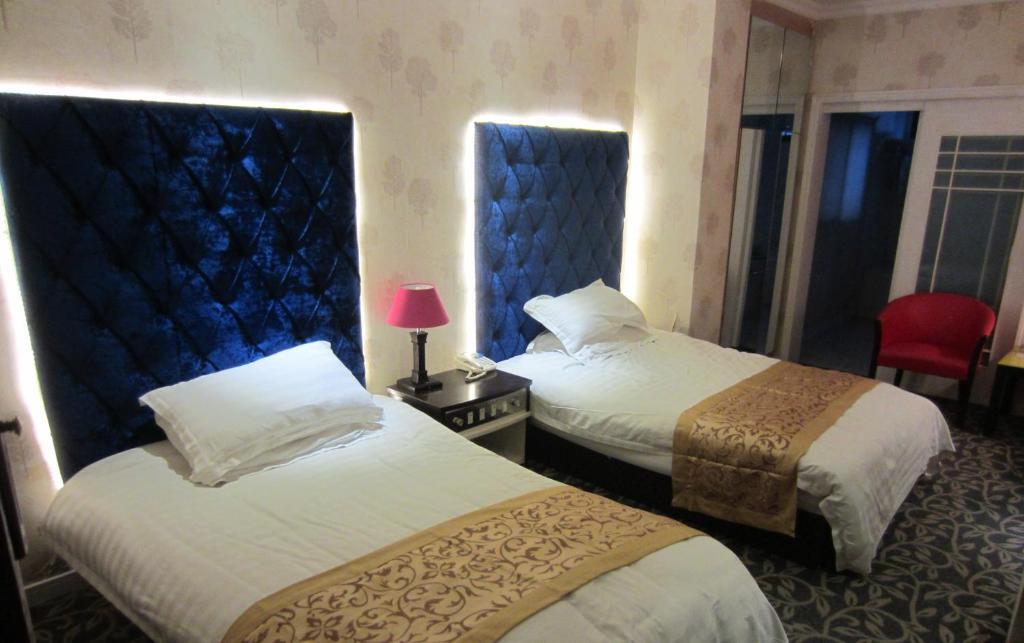 Jiujiu Holiday Hotel Σανγκάη Δωμάτιο φωτογραφία