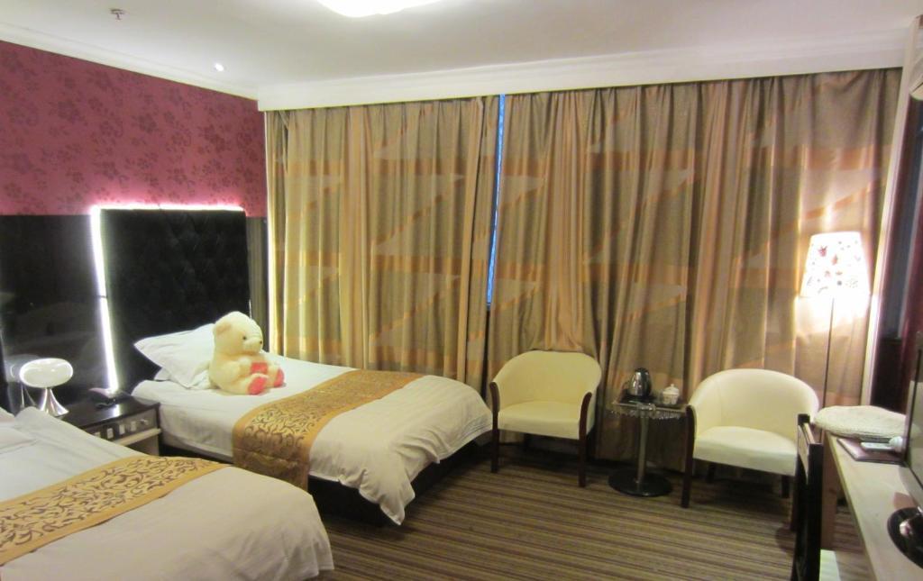 Jiujiu Holiday Hotel Σανγκάη Δωμάτιο φωτογραφία